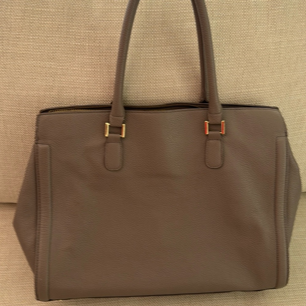 Shoulder or cross body bag from H&M, three interior pockets.